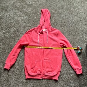 Women’s bright orange hoodie. Size XL
